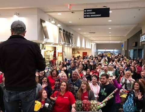 a crowd at an event inside Markland Mall
